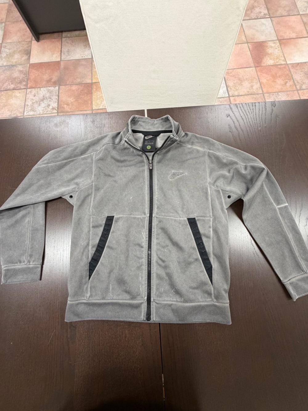 One size youth medium Nike zip up